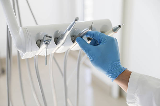 Professional Tooth Extraction technician working in Manchester, MI